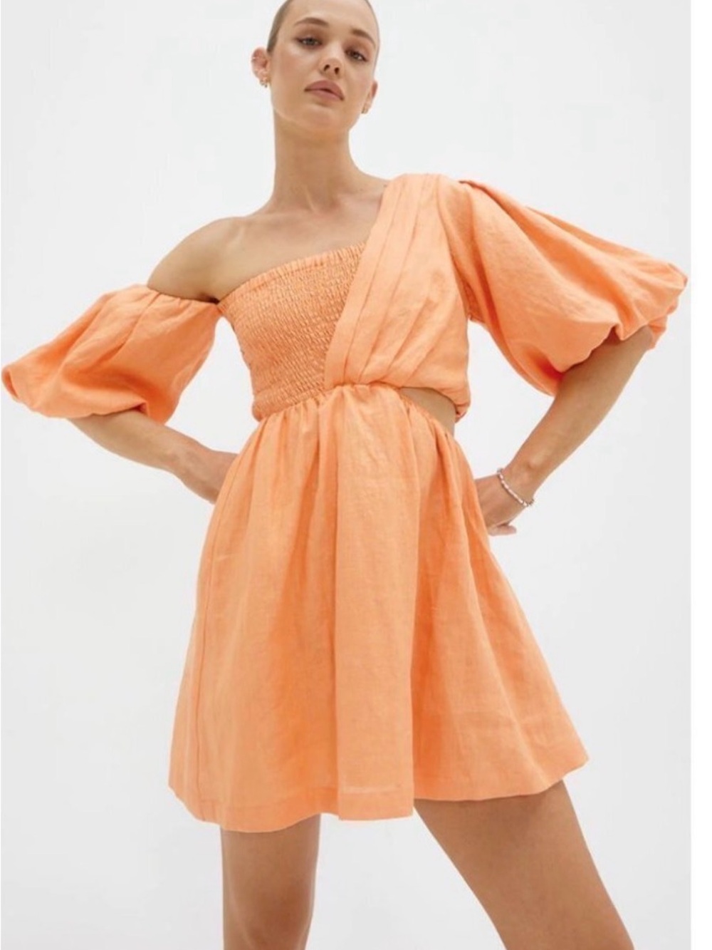 SOVERE | Anthropologie One-Shoulder Puff Sleeve Mini Dress in Peach
